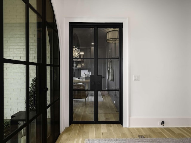 9021 Passiflora Ct, College Grove, TN 37046 - detailed view of wood finished floors and french doors