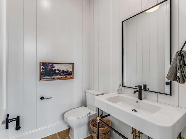 9021 Passiflora Ct, College Grove, TN 37046 - bathroom featuring toilet, a sink, and wood finished floors