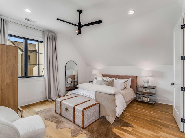 9021 Passiflora Ct, College Grove, TN 37046 - bedroom with lofted ceiling, baseboards, light wood-style flooring, a ceiling fan, and recessed lighting