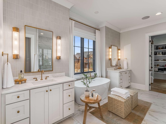 9021 Passiflora Ct, College Grove, TN 37046 - full bath with marble finish floors, a soaking tub, two vanities, crown molding, and tile walls