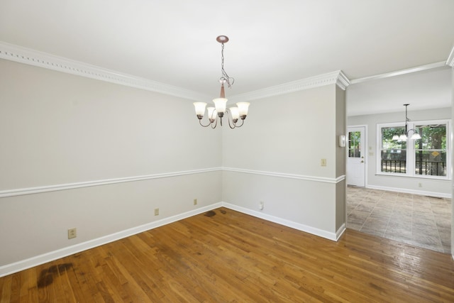 3031 Hartford Dr, Murfreesboro, TN 37129 - unfurnished room featuring a chandelier, wood finished floors, ornamental molding, and baseboards