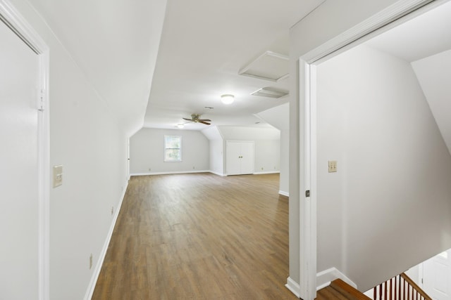 3031 Hartford Dr, Murfreesboro, TN 37129 - additional living space featuring wood finished floors, baseboards, vaulted ceiling, and attic access