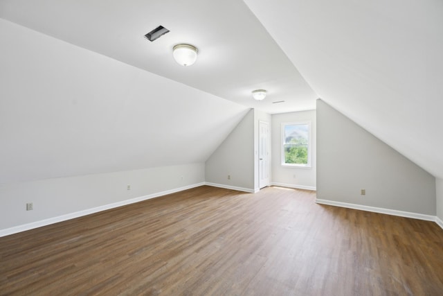 3031 Hartford Dr, Murfreesboro, TN 37129 - additional living space featuring dark wood-style floors, lofted ceiling, and baseboards