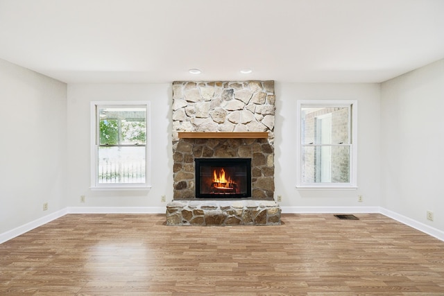 3031 Hartford Dr, Murfreesboro, TN 37129 - unfurnished living room featuring wood finished floors, a fireplace, baseboards, and recessed lighting