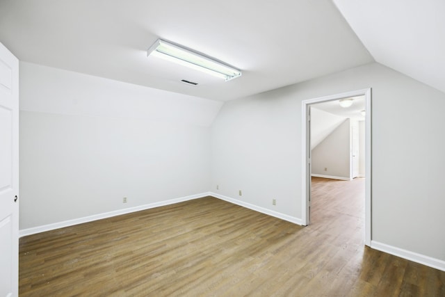 3031 Hartford Dr, Murfreesboro, TN 37129 - additional living space with vaulted ceiling, wood finished floors, and baseboards