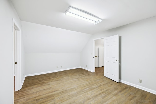 3031 Hartford Dr, Murfreesboro, TN 37129 - additional living space featuring vaulted ceiling, baseboards, and wood finished floors