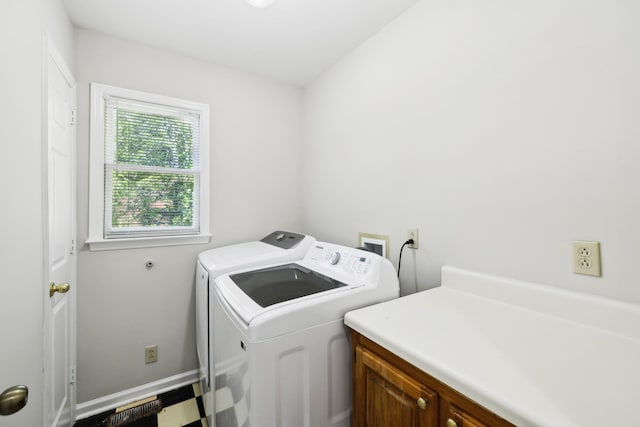 3031 Hartford Dr, Murfreesboro, TN 37129 - washroom with washing machine and dryer, cabinet space, and baseboards