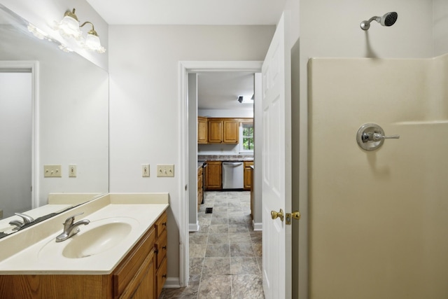 3031 Hartford Dr, Murfreesboro, TN 37129 - bathroom with vanity, baseboards, and a shower