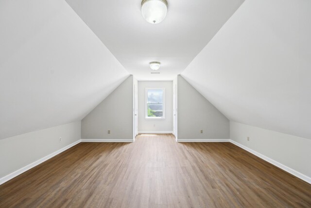 3031 Hartford Dr, Murfreesboro, TN 37129 - bonus room with wood finished floors, baseboards, and vaulted ceiling