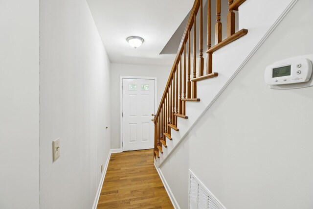 3031 Hartford Dr, Murfreesboro, TN 37129 - doorway to outside with light wood-type flooring, stairs, and baseboards