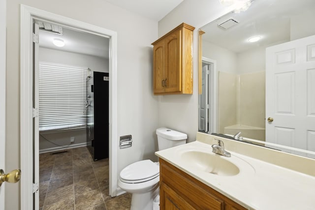 3031 Hartford Dr, Murfreesboro, TN 37129 - bathroom with vanity, toilet, stone finish floors, and baseboards