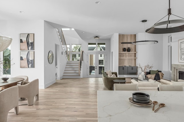 2801A W Kirkwood Ave, Nashville, TN 37204 - living area with stairway, light wood-style floors, baseboards, a fireplace, and recessed lighting