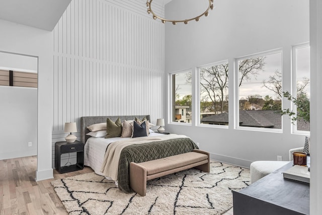 2801A W Kirkwood Ave, Nashville, TN 37204 - bedroom with a high ceiling, wood finished floors, and baseboards