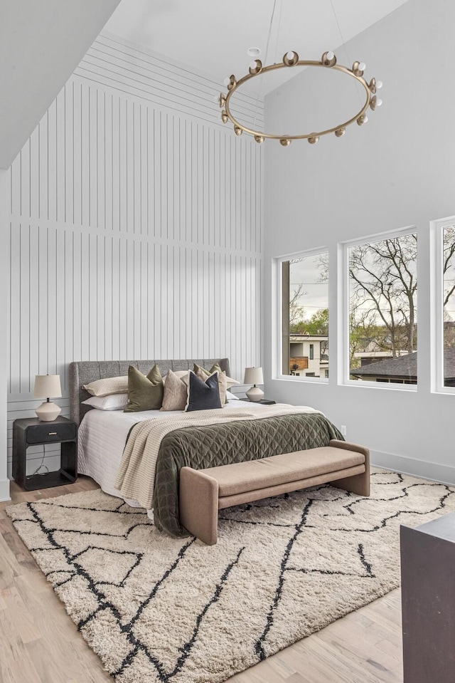2801A W Kirkwood Ave, Nashville, TN 37204 - bedroom featuring wood finished floors, a high ceiling, and baseboards