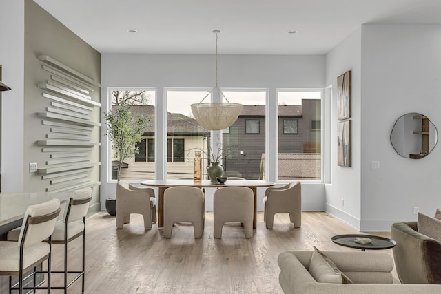 2801A W Kirkwood Ave, Nashville, TN 37204 - dining room featuring healthy amount of natural light, light wood finished floors, and baseboards