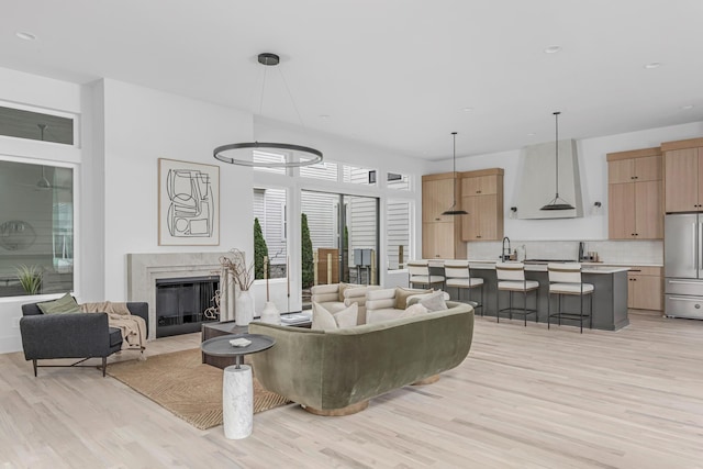 2801A W Kirkwood Ave, Nashville, TN 37204 - living room with light wood-style floors, a premium fireplace, and recessed lighting