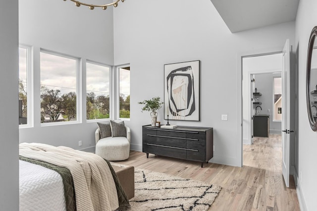 2801A W Kirkwood Ave, Nashville, TN 37204 - bedroom with a high ceiling, light wood-type flooring, and baseboards