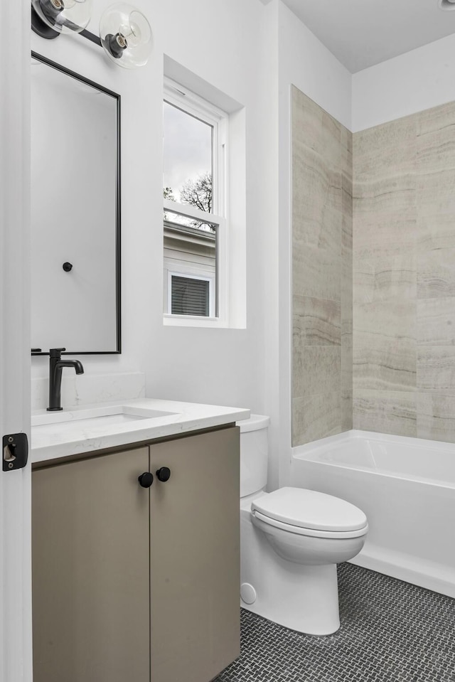 2801A W Kirkwood Ave, Nashville, TN 37204 - bathroom featuring vanity, toilet, bathtub / shower combination, and tile patterned flooring