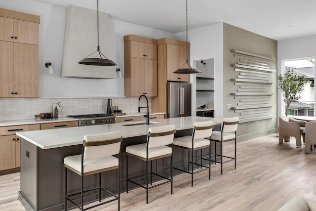 2801A W Kirkwood Ave, Nashville, TN 37204 - kitchen with high end refrigerator, a sink, a center island with sink, and light countertops