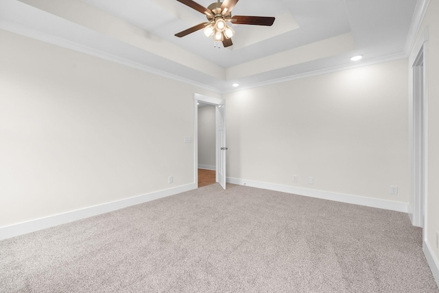 1928 Flats Rd, Cunningham, TN 37052 - empty room with a ceiling fan, carpet flooring, recessed lighting, baseboards, and a tray ceiling
