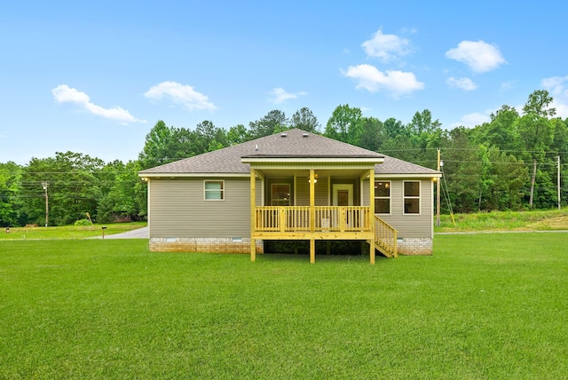 1928 Flats Rd, Cunningham, TN 37052 - back of property featuring crawl space, a lawn, and roof with shingles
