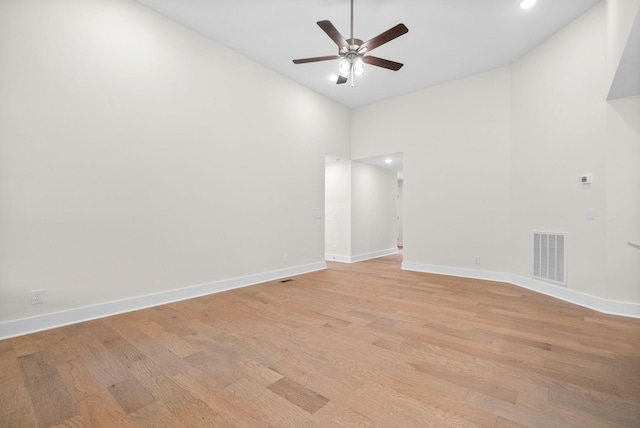 1928 Flats Rd, Cunningham, TN 37052 - empty room with ceiling fan, high vaulted ceiling, light wood-type flooring, baseboards, and recessed lighting