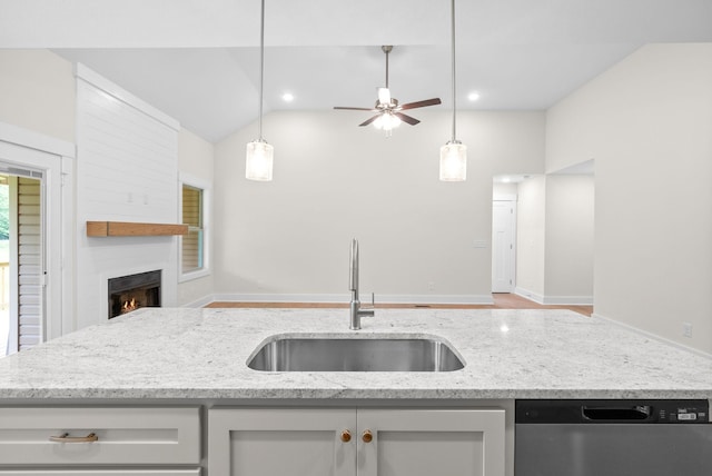 1928 Flats Rd, Cunningham, TN 37052 - kitchen with dishwasher, a sink, a ceiling fan, light stone counters, and lofted ceiling
