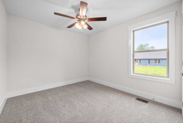 1928 Flats Rd, Cunningham, TN 37052 - carpeted spare room featuring a ceiling fan and baseboards