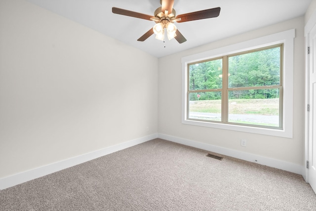 1928 Flats Rd, Cunningham, TN 37052 - empty room featuring light carpet, baseboards, and ceiling fan