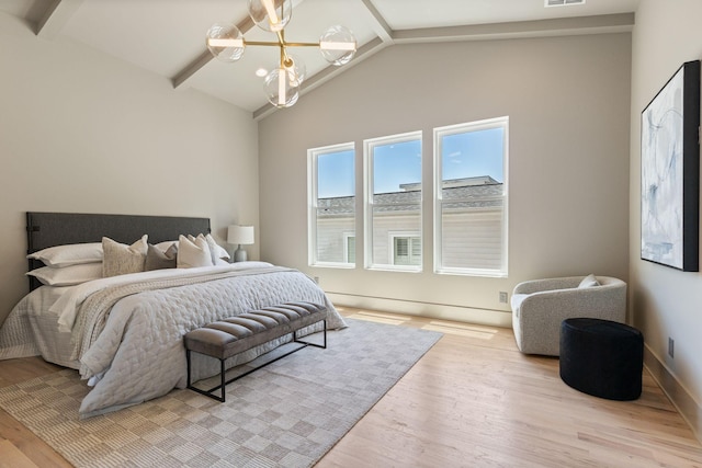 2801B W Kirkwood Ave, Nashville, TN 37204 - bedroom featuring a chandelier, wood finished floors, beamed ceiling, baseboards, and high vaulted ceiling
