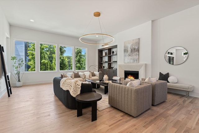 2801B W Kirkwood Ave, Nashville, TN 37204 - living room featuring light wood finished floors, baseboards, a fireplace, and recessed lighting