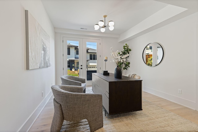 2801B W Kirkwood Ave, Nashville, TN 37204 - home office featuring a chandelier, light wood finished floors, baseboards, and a fireplace