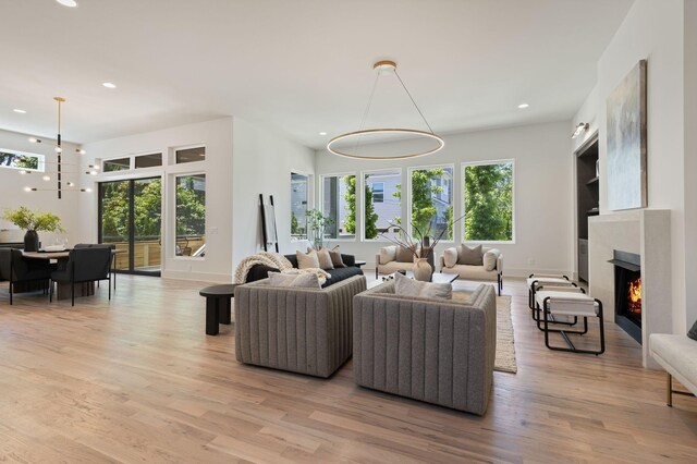 2801B W Kirkwood Ave, Nashville, TN 37204 - living area featuring recessed lighting, light wood-style flooring, and a lit fireplace