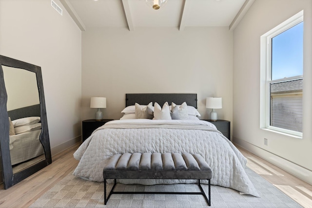 2801B W Kirkwood Ave, Nashville, TN 37204 - bedroom with beamed ceiling, light wood-style floors, and baseboards