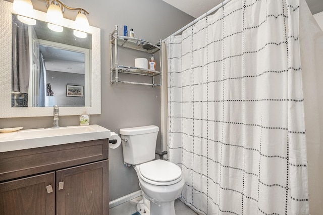 124 Gale Ln, La Vergne, TN 37086 - bathroom featuring vanity, toilet, baseboards, and a shower with shower curtain