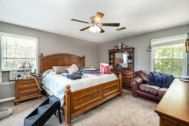124 Gale Ln, La Vergne, TN 37086 - bedroom featuring light carpet, multiple windows, ceiling fan, and cooling unit