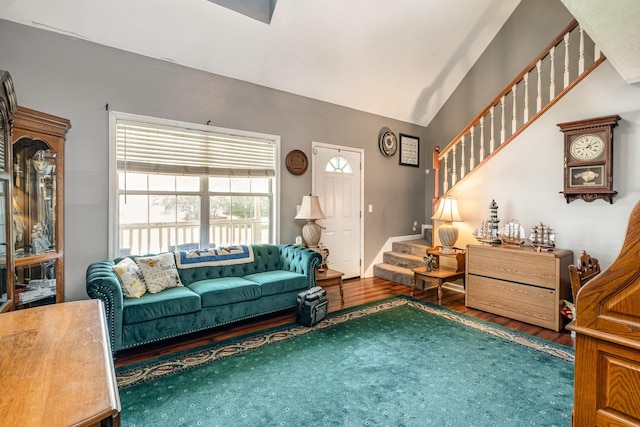 124 Gale Ln, La Vergne, TN 37086 - living area featuring stairs, wood finished floors, and lofted ceiling