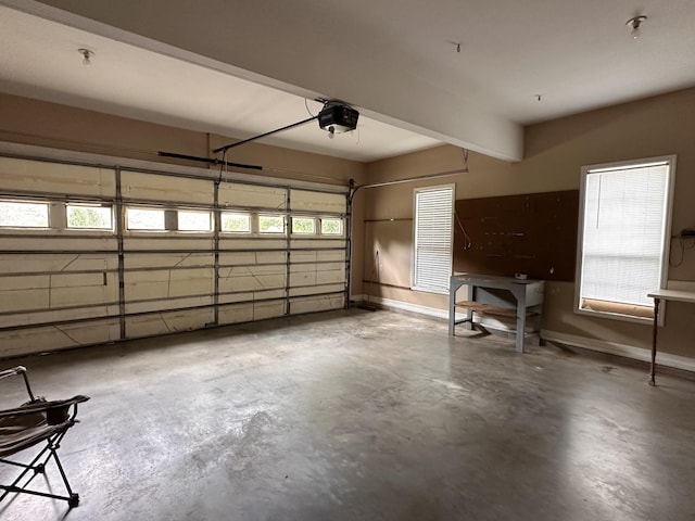 95 Dundee Cir, Mcminnville, TN 37110 - garage featuring a garage door opener and baseboards