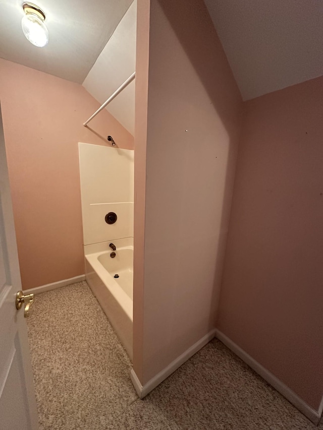 95 Dundee Cir, Mcminnville, TN 37110 - full bathroom with vaulted ceiling, baseboards, and washtub / shower combination