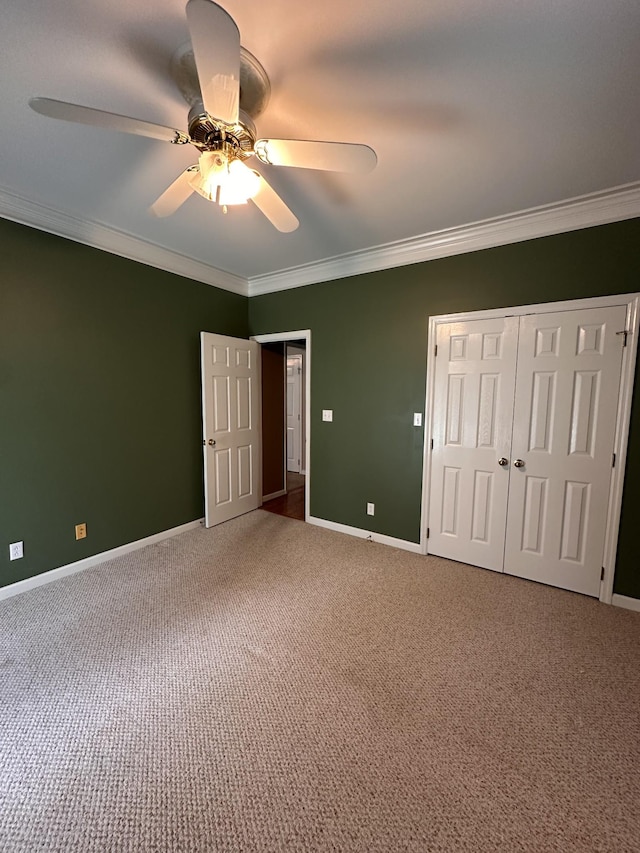 95 Dundee Cir, Mcminnville, TN 37110 - unfurnished bedroom featuring ornamental molding, carpet floors, baseboards, a ceiling fan, and a closet
