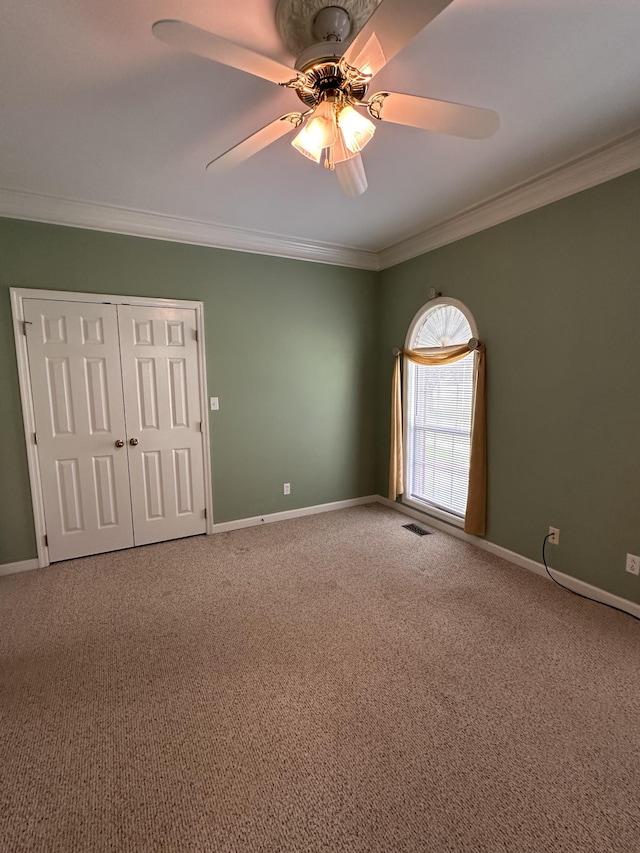 95 Dundee Cir, Mcminnville, TN 37110 - unfurnished bedroom with ornamental molding, carpet floors, baseboards, and a ceiling fan