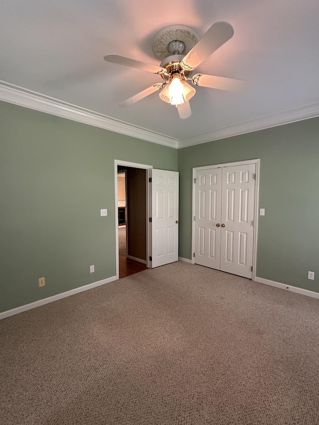 95 Dundee Cir, Mcminnville, TN 37110 - unfurnished bedroom featuring ornamental molding, baseboards, carpet floors, ceiling fan, and a closet