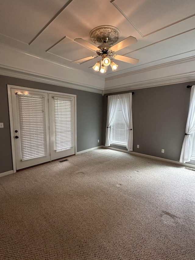95 Dundee Cir, Mcminnville, TN 37110 - empty room featuring carpet flooring, ceiling fan, baseboards, and ornamental molding