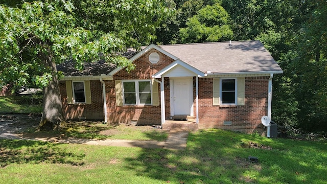 129 Peggy Ct, Goodlettsville, TN 37072 - bungalow-style home featuring a front yard, brick siding, a shingled roof, and crawl space