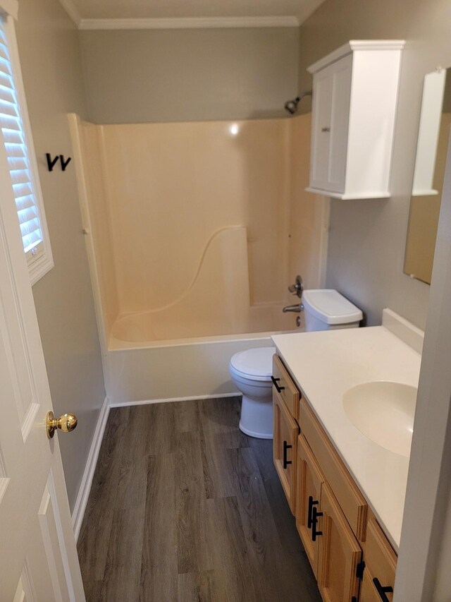 129 Peggy Ct, Goodlettsville, TN 37072 - full bathroom featuring vanity, wood finished floors, toilet, bathtub / shower combination, and ornamental molding