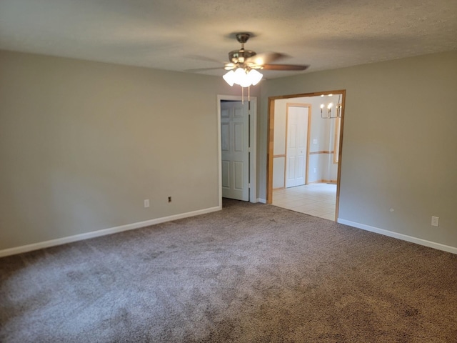129 Peggy Ct, Goodlettsville, TN 37072 - spare room with light carpet, a ceiling fan, baseboards, and a chandelier