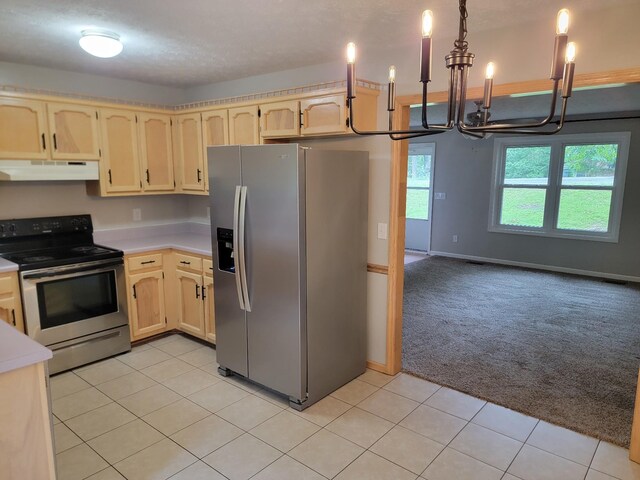 129 Peggy Ct, Goodlettsville, TN 37072 - kitchen with appliances with stainless steel finishes, a chandelier, under cabinet range hood, light colored carpet, and light brown cabinets