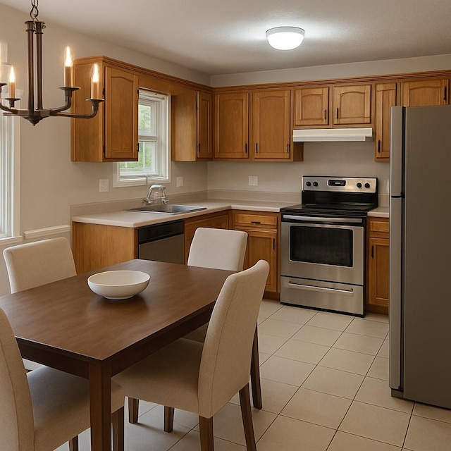 129 Peggy Ct, Goodlettsville, TN 37072 - kitchen with appliances with stainless steel finishes, under cabinet range hood, a sink, and light countertops