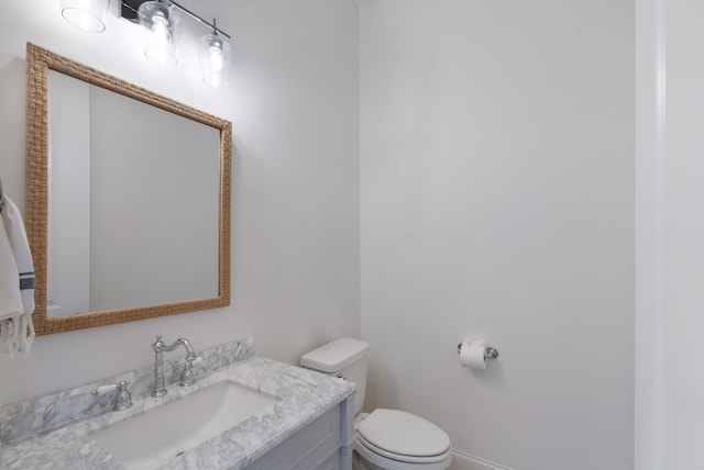 4761 Woodrow Pl, Arrington, TN 37014 - bathroom featuring toilet, vanity, and baseboards
