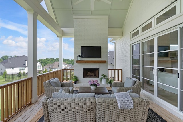 4761 Woodrow Pl, Arrington, TN 37014 - wooden terrace featuring an outdoor living space with a fireplace and a residential view